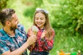 It is my life. daughter and father love dandelion flower. family summer farm. ecology. Happy family day. little girl and Royalty Free Stock Photo