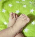 Tiny feet touch your heart