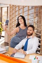 Amorous woman flirting with her boss Royalty Free Stock Photo