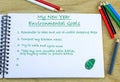 My New Year Environmental Goals heading with list of environmentally friendly ideas written in journal. New year environmental Royalty Free Stock Photo