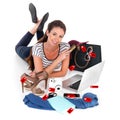 My online shopping spree. Portrait of a young woman doing online shopping isolated on white. Royalty Free Stock Photo