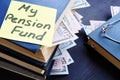 My pension fund. Books with dollar bills and glasses. Royalty Free Stock Photo