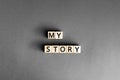 My story - phrase from wooden blocks with letters
