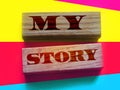 My story words on wooden blocks. Personal brand concept