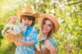 My sweet baby. Happy family day. Mother and cute son in hats. Family farm. Spend time together. Lovely family outdoors Royalty Free Stock Photo