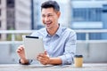 My tablet helps me with everything. a young businessman using a digital tablet at work. Royalty Free Stock Photo