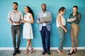 My team can handle anything. Full length shot of a diverse group of businesspeople standing together in the office and Royalty Free Stock Photo