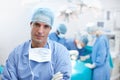 My team is world-class. Portrait of a serious surgeon standing in an operating theatre. Royalty Free Stock Photo