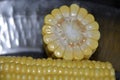 Sweet corn cut into two pieces and clicked.