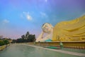 Mya Tha Lyaung Reclining Buddha with interesting sky colour approaching sunset