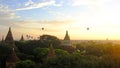 Sunrise in Bagan top view with hot air ballooons flying on a horizont Royalty Free Stock Photo