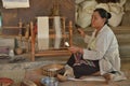 Myanmar Bagan weaving machine old lady
