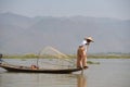 Burma style fishman fishing canoe boat