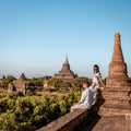 Myanmar, couple sunrise Bagan, men woman sunset Bagan .old city of Bagan Myanmar, Pagan Burma Asia old ruins Pagodas and Royalty Free Stock Photo