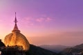 Take photo the Kyaikhtiyo Golden Rock pagoda and temple and beautiful sunshine view. This Photo contain burry and soft focus.,