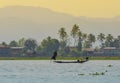 Myanmar fishman riding canoe boat
