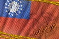 Myanmar flag and Covid-19 biohazard symbol with quarantine orange tape and stamp. Coronavirus or 2019-nCov virus concept