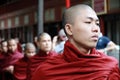 Myanmar monk in line