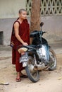 Myanmar monk with motorbike Royalty Free Stock Photo