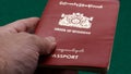 Myanmar passport on green table