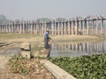 Myanmar - teakwood U Bein Bridge with fisherman fishing with net Royalty Free Stock Photo