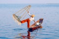 Traditional Burmese fisherman at Inle lake, Myanmar famous for their distinctive one legged rowing style