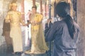 Myanmar wedding photography. A Burmese couple in a tradition dress that was photographed by a wedding photographer and his