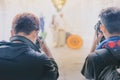 Myanmar wedding photography. A Burmese couple in a tradition dress that was photographed by a wedding photographer and his