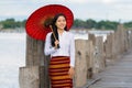 Myanmar woman at U Bein bridge at Amarapura Manndalay