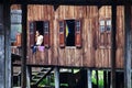 Myanmar woman at the window Royalty Free Stock Photo