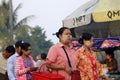 Myanmese woman with thanakha Myanmar powder on her face carry the bag to going to the market in the morning at Yangon