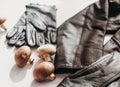 mycelium leather, bio based sustainable alternative leather made of mushrooms. plant textile. Jacket and gloves. eco