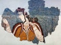 Mycenaean fresco wall painting fragment depicting a woman from a ceremonial procession in Tiryns palace Royalty Free Stock Photo