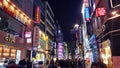 Myeong-dong shopping district in Seoul at night