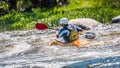 Rafting, kayaking. An unidentified man are sailing on his short Dagger whitewater kayak. Ecological water tourism.