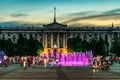 Glowing purple pedestrian fountain on the square near the Mykolaiv City Council