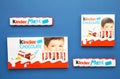 Mykolaiv, Ukraine - July 28, 2023: Kinder chocolate bars on blue background.Kinder bars are produced by Ferrero founded in 1946