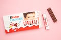 Mykolaiv, Ukraine - July 28, 2023: Kinder chocolate bars on pink background.Kinder bars are produced by Ferrero founded in 1946