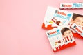 Mykolaiv, Ukraine - July 28, 2023: Kinder chocolate bars on pink background.Kinder bars are produced by Ferrero founded in 1946