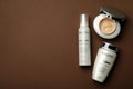 MYKOLAIV, UKRAINE - SEPTEMBER 07, 2021: Set of Kerastase hair care cosmetic products on brown background, flat lay. Space for text