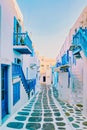 Mykonos Greece , colorful streets of the old town of Mykonos with tourist in the street Royalty Free Stock Photo