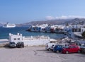 Panoramic view of the sights of the island of Little Venice with walking tourists in Mykonos, Greece. Royalty Free Stock Photo