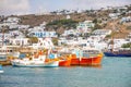 Mykonos, Greece - 17.10.2018: Port of Mykonos Town with white arhitecture and colorfull boats, Greece