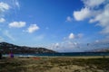 Mykonos, Greece - September 28, 2017: Kitesurfing, kind of extreme water sports in strong wind for windsurfer activity at Korfos Royalty Free Stock Photo