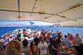 Mykonos, Greece, 11 September 2018, Tourists at the old port embark on special ferries to the island of Delos Royalty Free Stock Photo