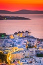 Mykonos, Greece. Sunset over Aegean Sea and the famous windmill from above, Cyclades Royalty Free Stock Photo