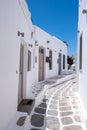 Mykonos, Greece. Traditional white buildings and narrow streets, blue sky background Royalty Free Stock Photo