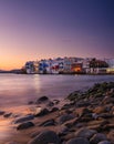 Mykonos, Greece. View of a traditional house in Mykonos. The area of Little Venice. Seascape during sunset. Sea shore and beach. Royalty Free Stock Photo