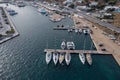 Mykonos island marina, aerial drone view. Sailboats and yachts anchored at port dock. Greece, Cyclades Royalty Free Stock Photo