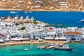 Mykonos port with boats and windmills, Cyclades islands, Greece Royalty Free Stock Photo